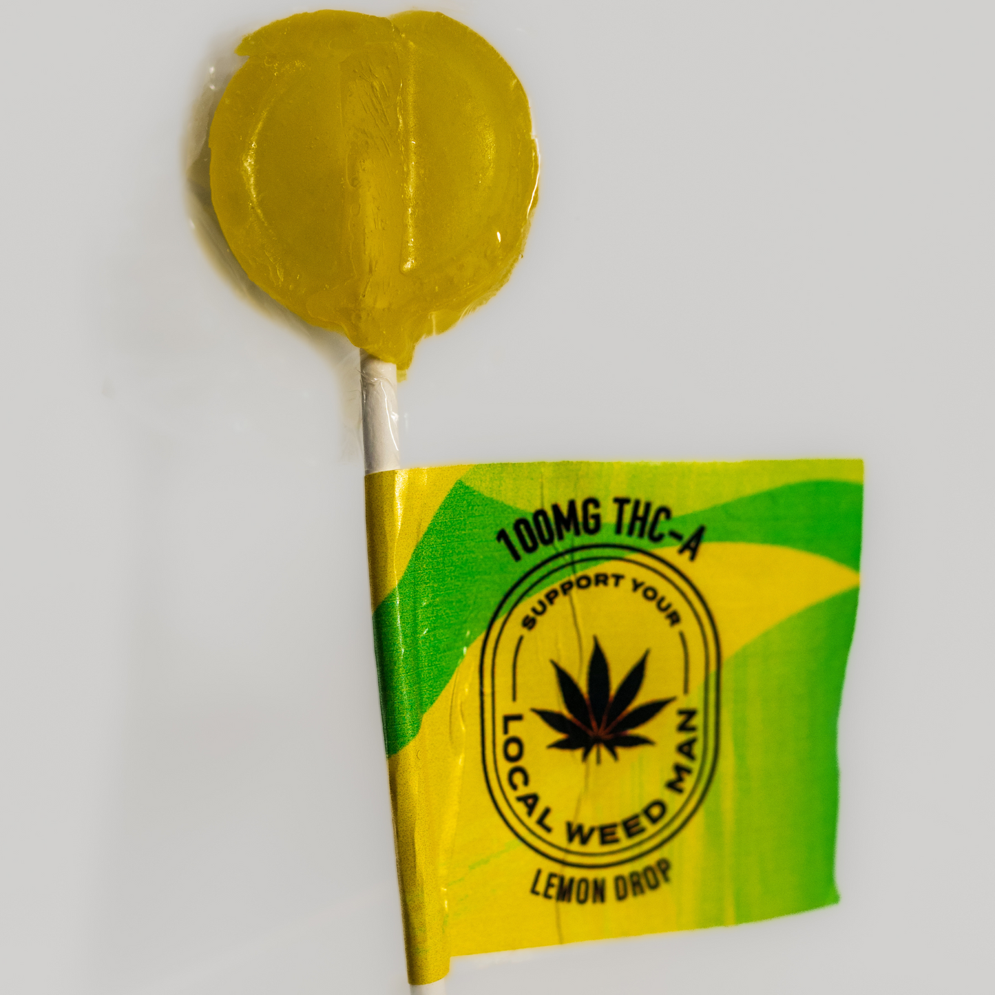 A photo of a 100mg Lemon Drop Lollipop from Support Your Local Weed Man in the Edible category. Tags: Edibles